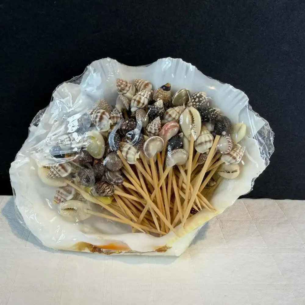 Shell Toothpicks For Appetizers in larger shell. Vintage party item